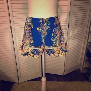Surf Gypsy ruffle bottom neon shorts